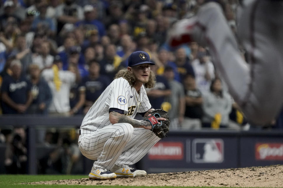 Milwaukee Brewers relief pitcher Josh Hader watches the last during their win against the Atlanta Braves in Game 1 of baseball's National League Divisional Series Friday, Oct. 8, 2021, in Milwaukee. (AP Photo/Morry Gash)