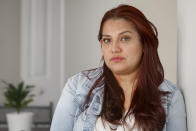 Victoria Cornejo Barrera, former head custodian for a high school in Columbia, South Carolina poses at her home in Columbia, S.C., Monday, June 10, 2024. The Pregnant Workers Fairness Act entitled her to the types accommodations she had been seeking when she was pregnant. (AP Photo/Nell Redmond)