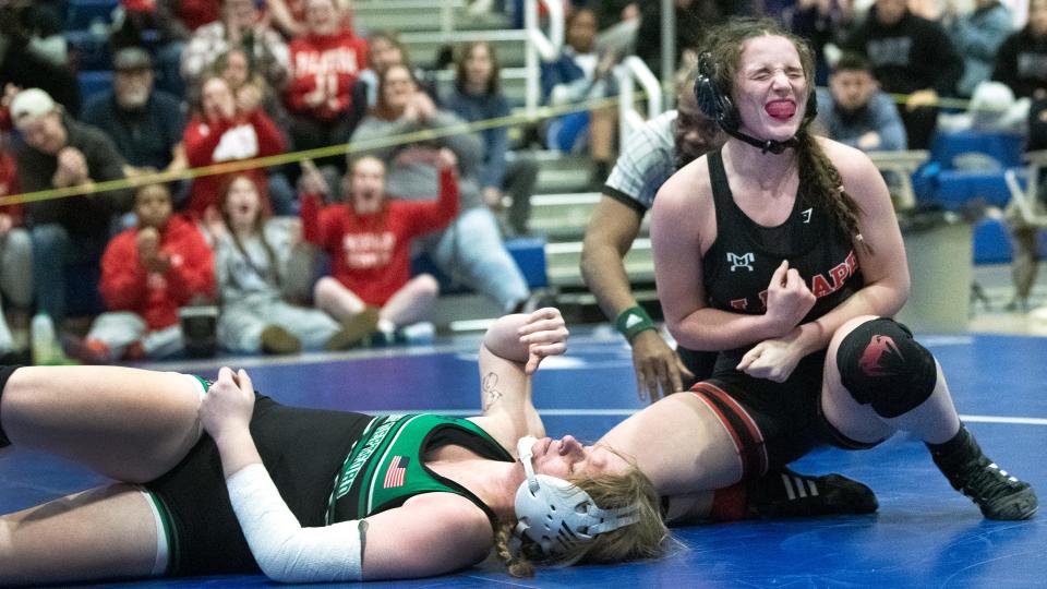 Lenape's Isabella Prem reacts after pinning West Deptford's Jaden Bennett to win the 145 lb. final bout of the South Region girls wrestling tournament held at Williamstown High School on Sunday, February 19, 2023.