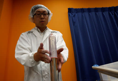 Sagami Rubber Industries' researcher explains condoms production process at a laboratory in Atsugi, Kanagawa Prefecture Japan May 16, 2018. Picture taken May 16, 2018. REUTERS/Kim Kyung-Hoon