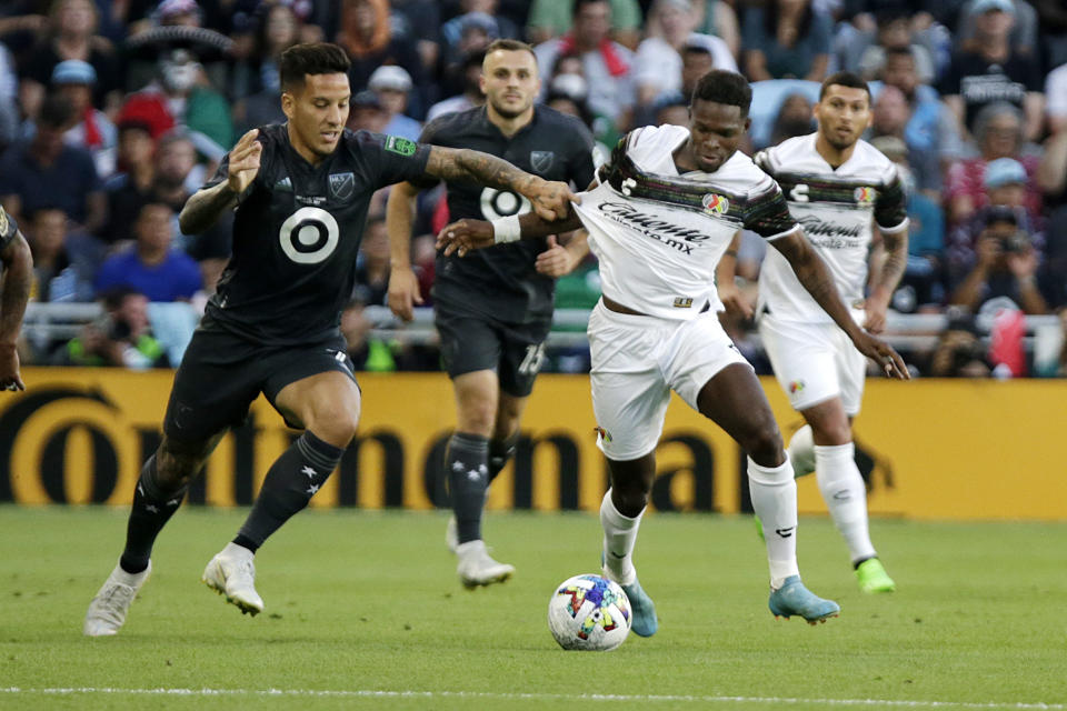 MLS All-Star Sebastián Driussi, left, and Liga MX All-Star Avilés Hurtado vie for the ball during the first half of the MLS All-Star soccer match against Wednesday, Aug. 10, 2022, in St. Paul, Minn. (AP Photo/Andy Clayton-King)