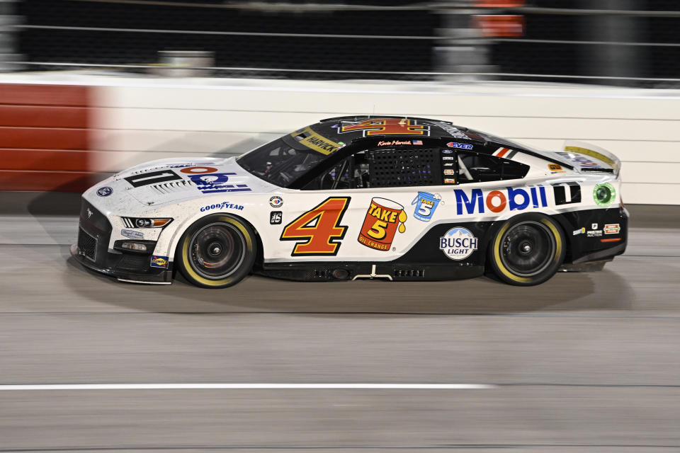 Kevin Harvick (4) steers into Turn 1 during a NASCAR Cup Series auto race at Darlington Raceway, Sunday, Sept. 3, 2023, in Darlington, S.C. (AP Photo/Matt Kelley)