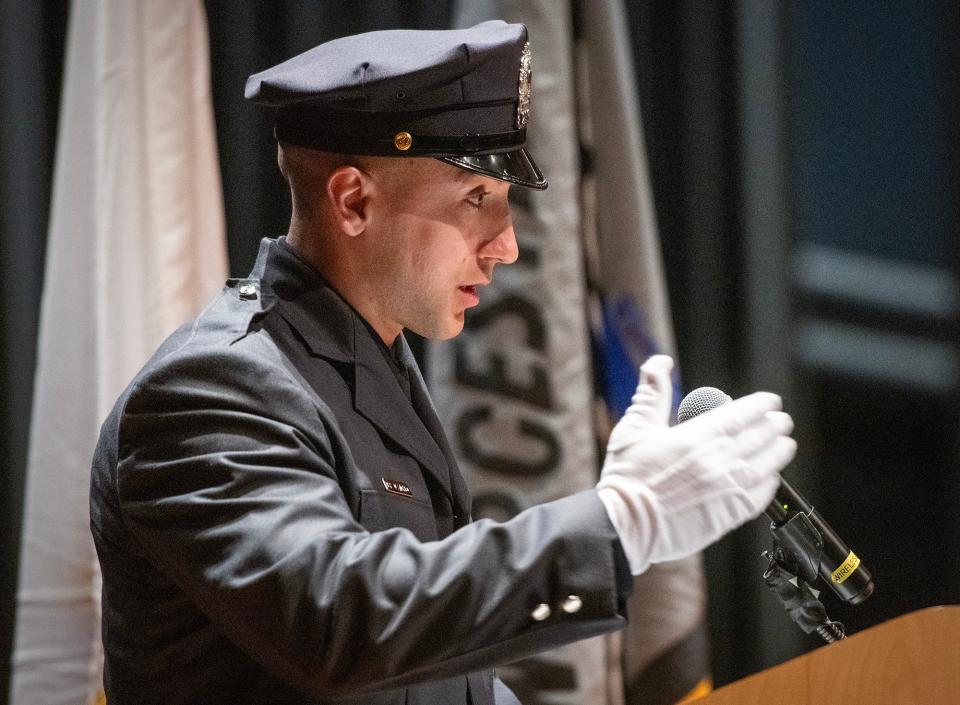 Worcester Police Academy recruit class President Dylan D’Angelo speaks during the graduation ceremony Friday at Worcester Technical High School.