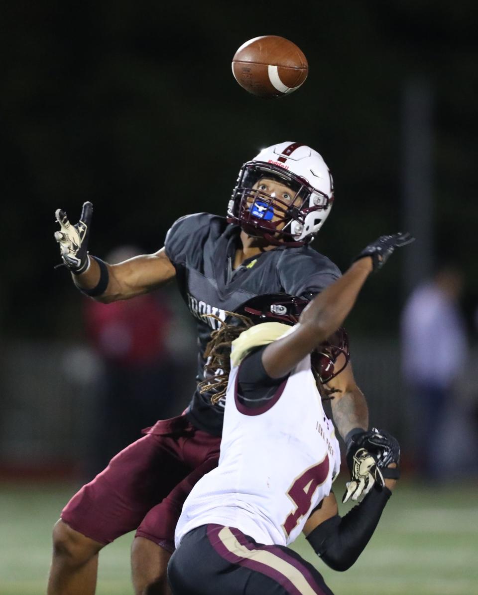 Iona Prep's Adande Nartey (4) breaks up a pass intended for Don Bosco's Bobby Mays (4) during their 42-35 win over Don Bosco at Don Bosco Preparatory High School in Ramsey, N.J. on Friday, September 16, 2022.  