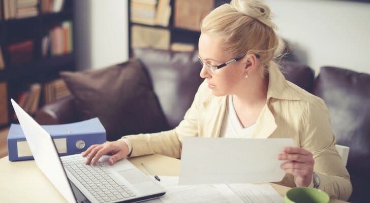 Self-employed woman figuring her taxes