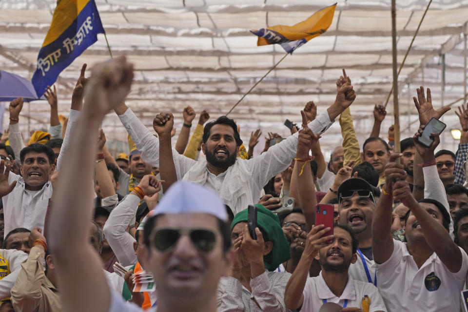 Supporters from various opposition parties shout anti government slogans during the 'Save Democracy' rally organized by INDIA bloc, a group formed by opposition parties, in New Delhi, India, Sunday, March 31, 2024. The "Save Democracy" rally was the first major public demonstration by the opposition bloc INDIA against the arrest of New Delhi's top elected official and opposition leader Arvind Kejriwal on March 21, in a liquor bribery case. (AP Photo/Manish Swarup)