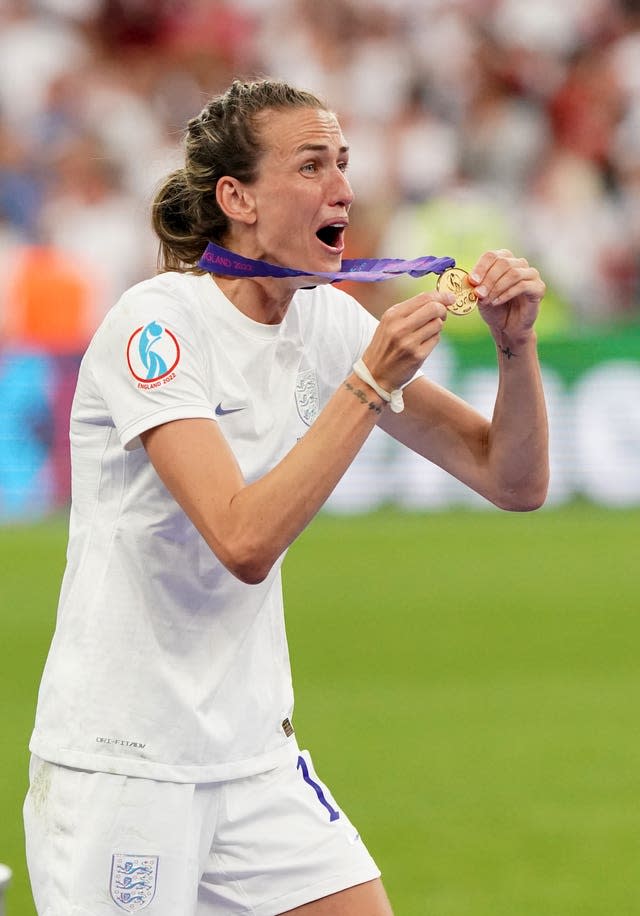 Scott, pictured with her Euro 2022 gold medal, hopes her story can inspire the young people she coaches 