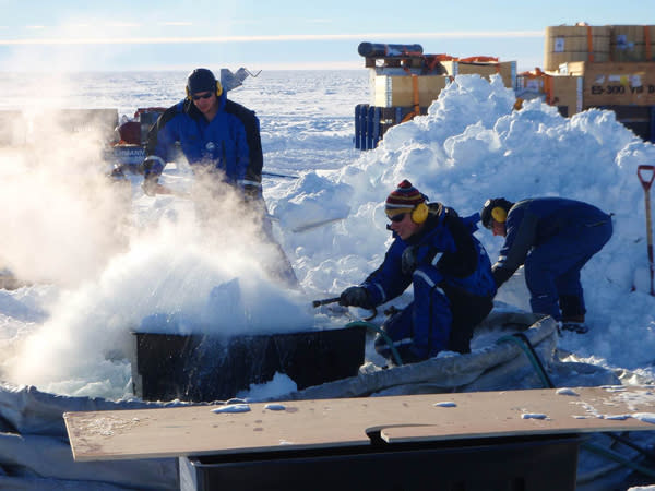 Researchers use hot water to drill through the thick Fimbul Ice Shelf in eastern Antarctica.