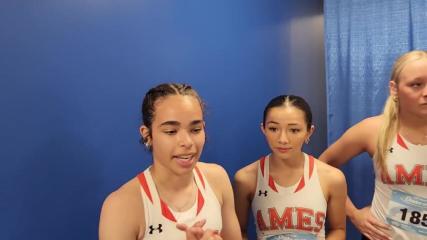 Ames girls shuttle hurdle relay girls following their race at the Drake Relays