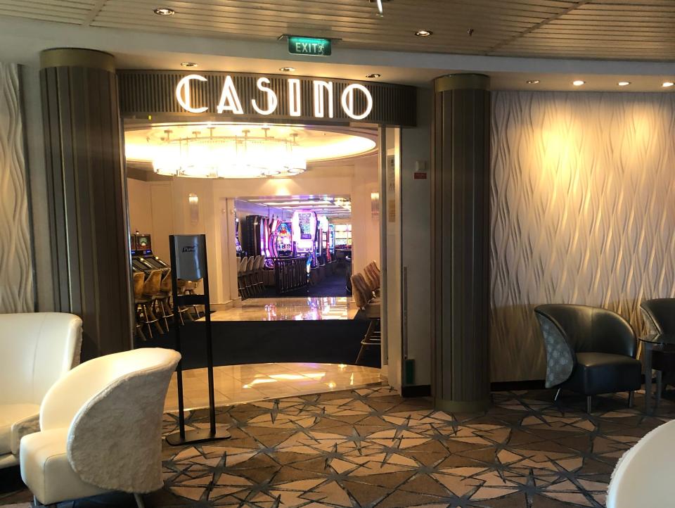 The cruise ship was outfitted with a casino, where guests betted on slot machines and card games..