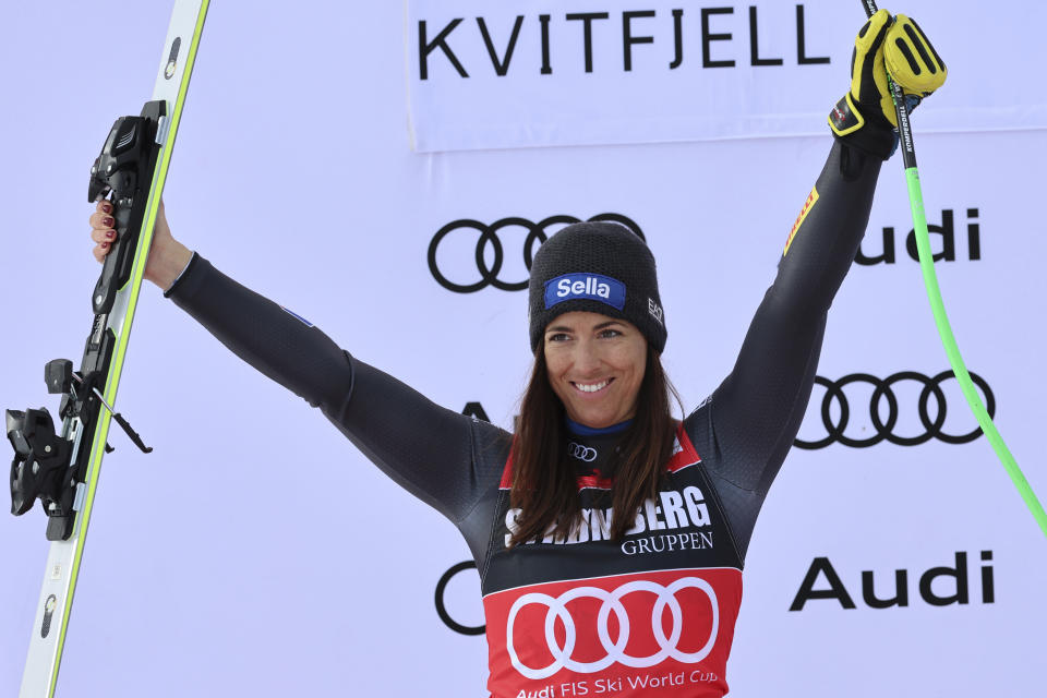Second placed Italy's Elena Curtoni celebrates after an alpine ski, women's World Cup Super G race in Kvitfjell, Norway, Friday, March 3, 2023. (AP Photo/Marco Trovati)