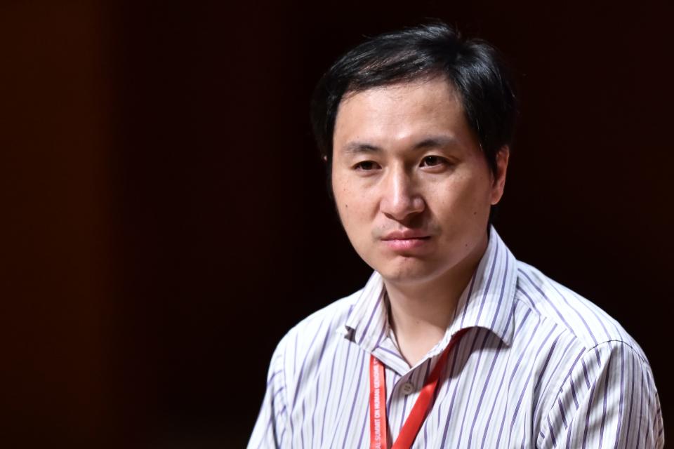 In this picture taken on November 28, 2018, Chinese scientist He Jiankui reacts during a panel discussion after his speech at the Second International Summit on Human Genome Editing in Hong Kong. - A scientist who upended a Hong Kong conference with his claim to have created the world's first genetically-edited babies cancelled a fresh talk and was heavily criticised by organisers on November 29, who labelled him as irresponsible. (Photo by Anthony WALLACE / AFP)        (Photo credit should read ANTHONY WALLACE/AFP via Getty Images)