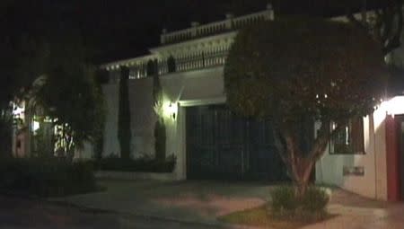 The home belonging to Chinese businessman Zhenli Ye Gon in Mexico City, Mexico is seen in this still image taken from video, in 2007. REUTERS TV