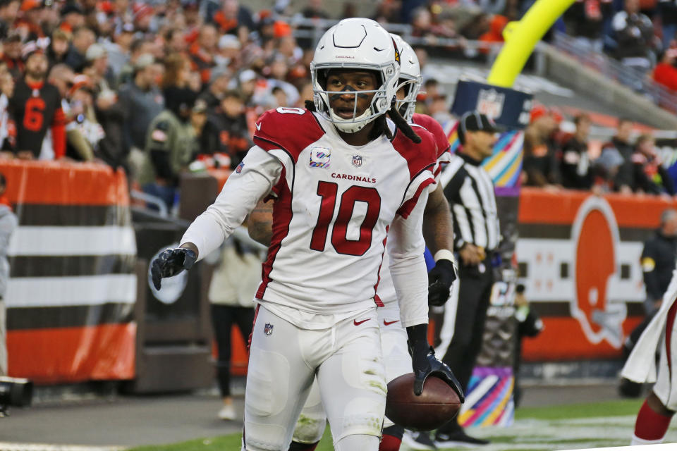 Arizona Cardinals wide receiver DeAndre Hopkins (10) celebrates after scoring a 9-yard touchdown during the second half of an NFL football game against the Cleveland Browns, Sunday, Oct. 17, 2021, in Cleveland. (AP Photo/Ron Schwane)