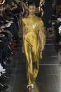 <p>Gabriela’s gold fringe dress in the most exquisite silk. (Photo: Getty Images) </p>