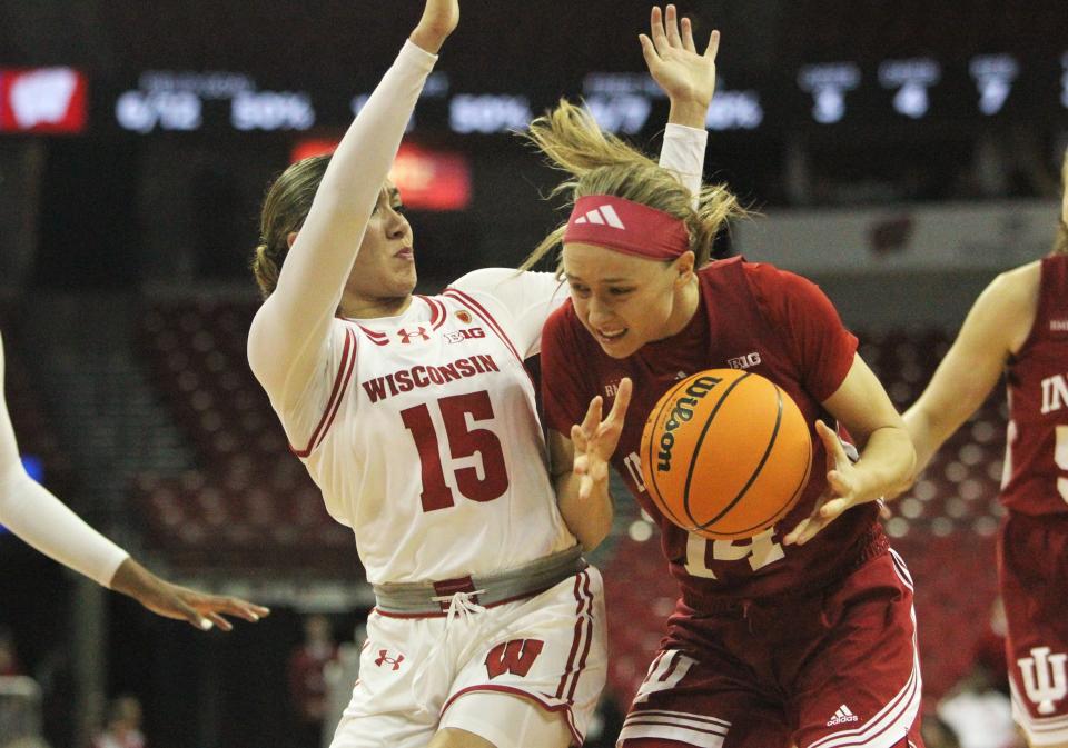 Wisconsin's Sania Copeland (15) defends Indiana's Sara Scalia on Wednesday Feb. 14, 2024 at the Kohl Center in Madison, Wisconsin.