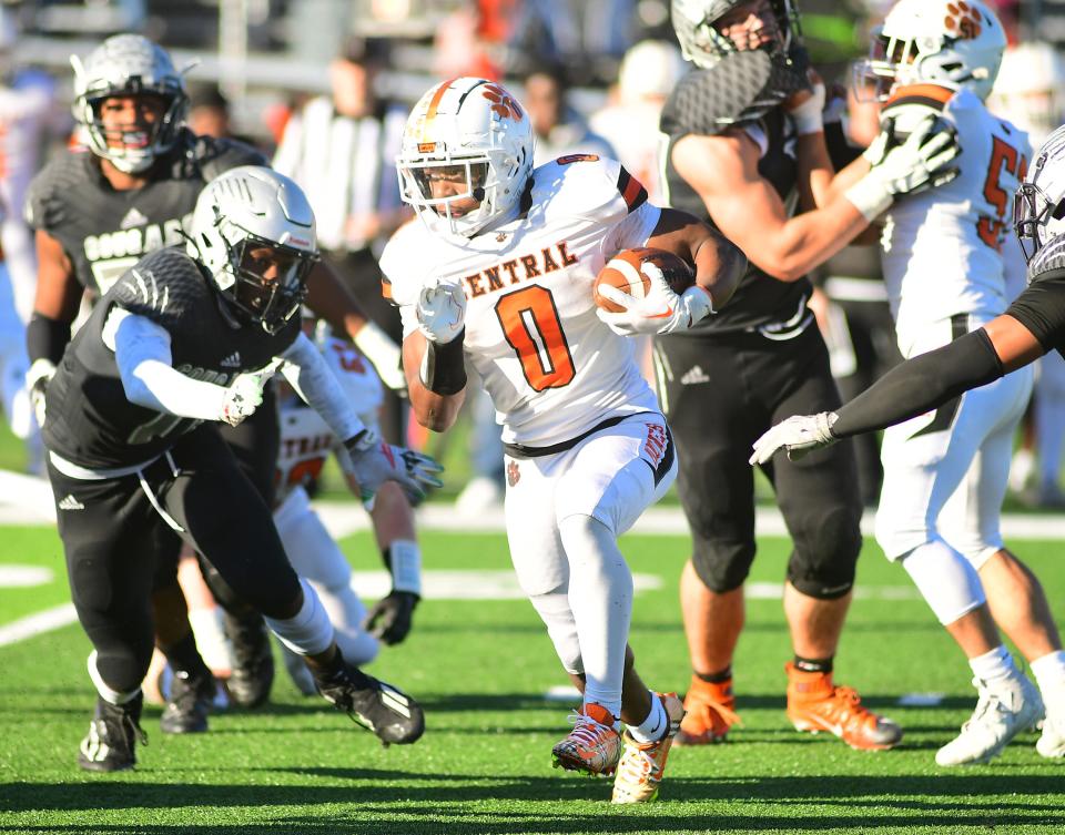 Central York's Juelz Goff looks for a path to a first down. Harrisburg defeated Central York, 28-21, Saturday, Nov. 18, 2023 at Severance Field to move to the D3 Class 6A final.