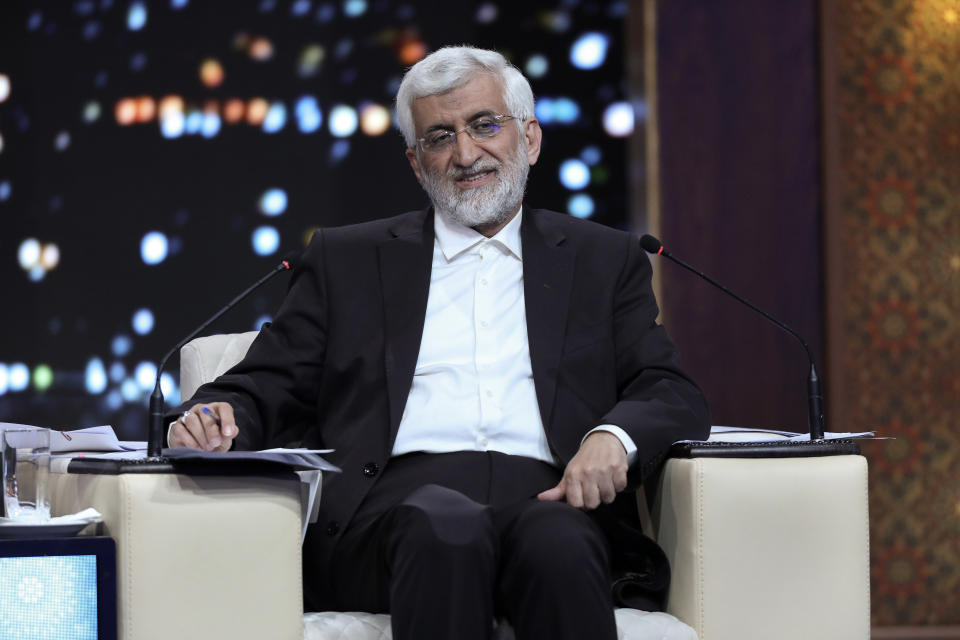 In this picture made available by Iranian state-run TV, IRIB, presidential candidate for the June 28 election Saeed Jalili, former Iran's top nuclear negotiator, speaks in a debate of the candidates at the TV studio in Tehran, Iran, Monday, June 17, 2024. (Morteza Fakhri Nezhad/IRIB via AP)