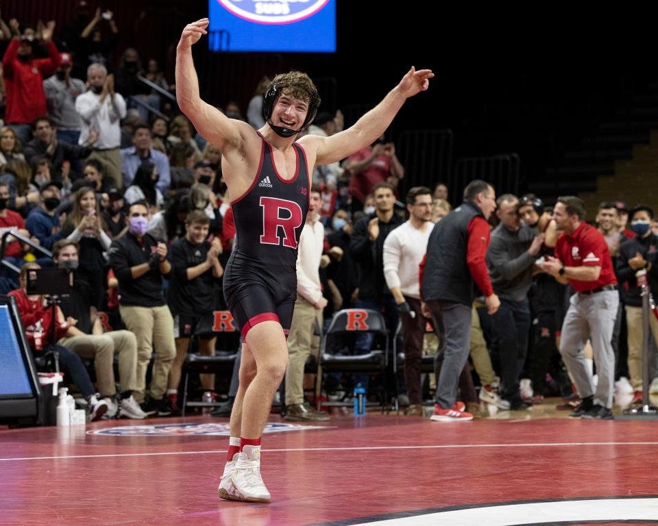 Rutgers 174-pounder Connor O'Neill celebrates after his 3-2 win over Princeton's Nate Dugan Friday night. Rutgers won the match 24-13.