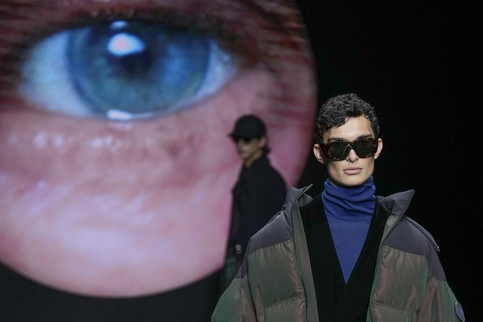 A model wears a creation part of the men's Giorgio Armani Fall-Winter 2024-2025 collection, that was presented in Milan, Italy, Sunday, Jan. 14, 2024. (AP Photo/Luca Bruno).