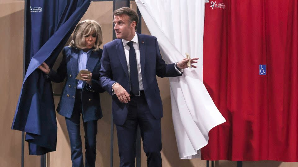 Macron and First Lady Brigitte Macron at the Touquet polling station, for the European elections, June 9, 2024. - Stephane Lemouton/SIPA/AP