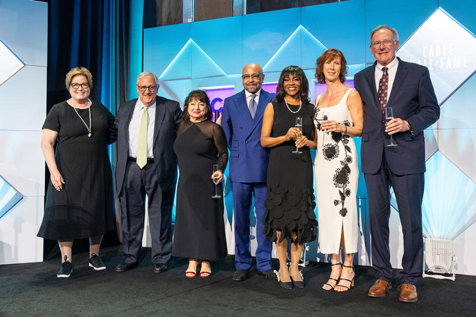 At the 2023 Cable Hall of Fame gala at New York’s Ziegfeld Ballroom (l. to r.): Diane Christman, president and CEO, The Syndeo Institute at The Cable Center; Michael Willner, chair of the Syndeo Institute at The Cable Center’s board; and inductees Italia Commisso Weinand, Mediacom; Douglas V. Holloway, Homewood Media; Wonya Lucas, Hallmark Media; Julie Laulis, Cable One; and Tom Adams, Charter.