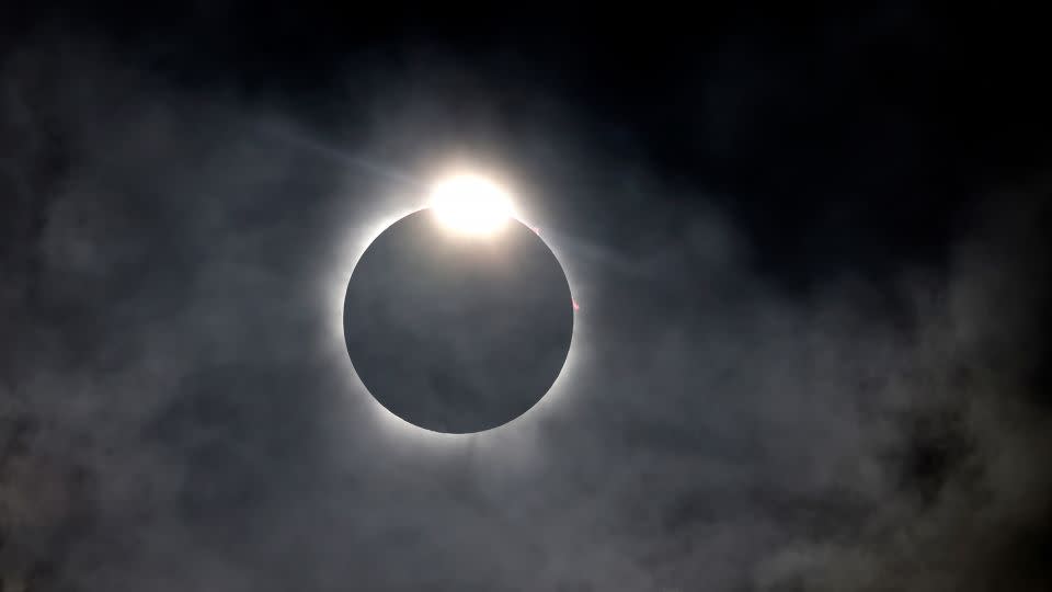 The diamond ring effect is seen as the moon eclipses the sun on Monday in Fort Worth, Texas. - Ron Jenkins/Getty Images