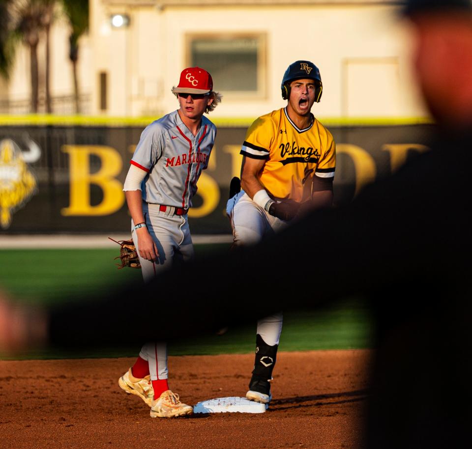 Jason Bello of the Bishop Verot baseball team celebrates a double against Clearwater Central Catholic in Class 3A, Region 2 quarterfinal at Bishop Verot in Fort Myers on Tuesday, May 6, 2023.  Bishop Verot won and moves on.  