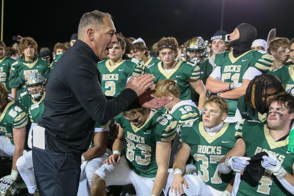 Westfield's Coach Jake Gilbert and his team celebrates their victory after Hamiliton Southeastern loses to Westfield High School in the IHSAA Class 6A Regional Championship, Nov 10, 2023; Westfield, IN, USA; at Westfield High School.