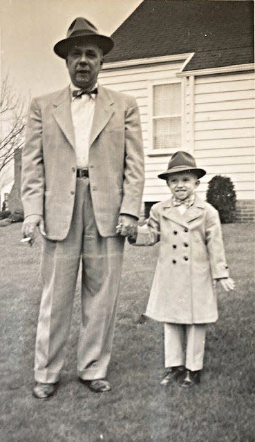 The Rev. Rich Hites, shown at age 5 with his father, Robert, has written a new memoir, "Black Medicine For a White Boy," which recalls the family's doctor, J.B. Walker, Canton's first Black physician.