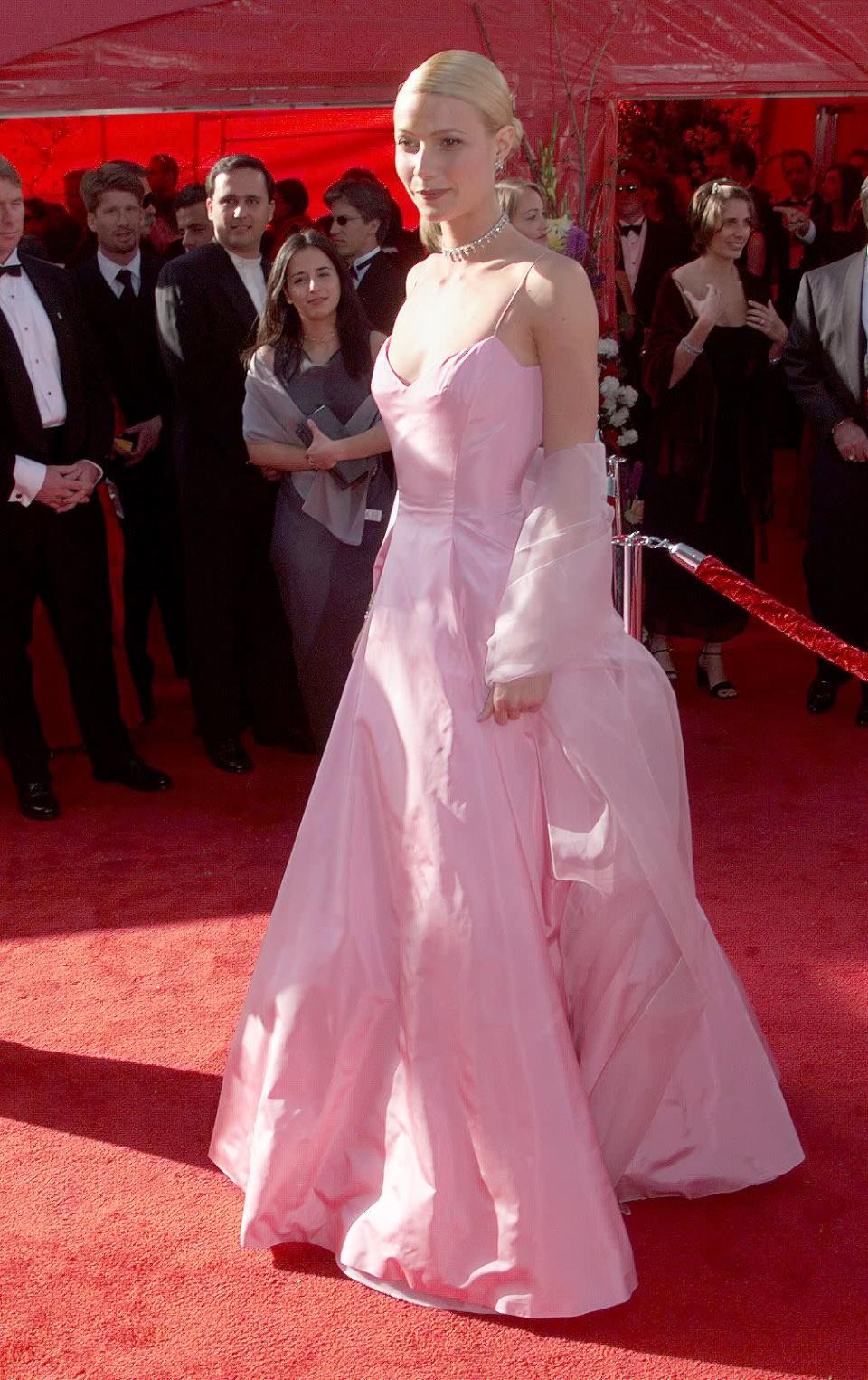 <p>The American actress walked the red carpet in this baby pink number in 1999, to pick up her best actress Oscar for ‘Shakespeare in Love’. Over 10 years later, Gwyneth revealed she had kept hold of the dress to pass on to her daughter, Apple.</p> 