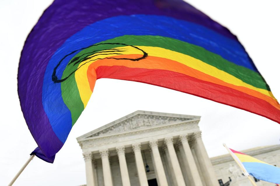 <span class="caption">A rainbow flag flies over the Supreme Court.</span> <span class="attribution"><a class="link " href="http://www.apimages.com/metadata/Index/LGBT-Rights-Religious-Exemptions/32964794191243f4994cc78129c7e9eb/28/0" rel="nofollow noopener" target="_blank" data-ylk="slk:AP Photo/Susan Walsh;elm:context_link;itc:0;sec:content-canvas">AP Photo/Susan Walsh</a></span>