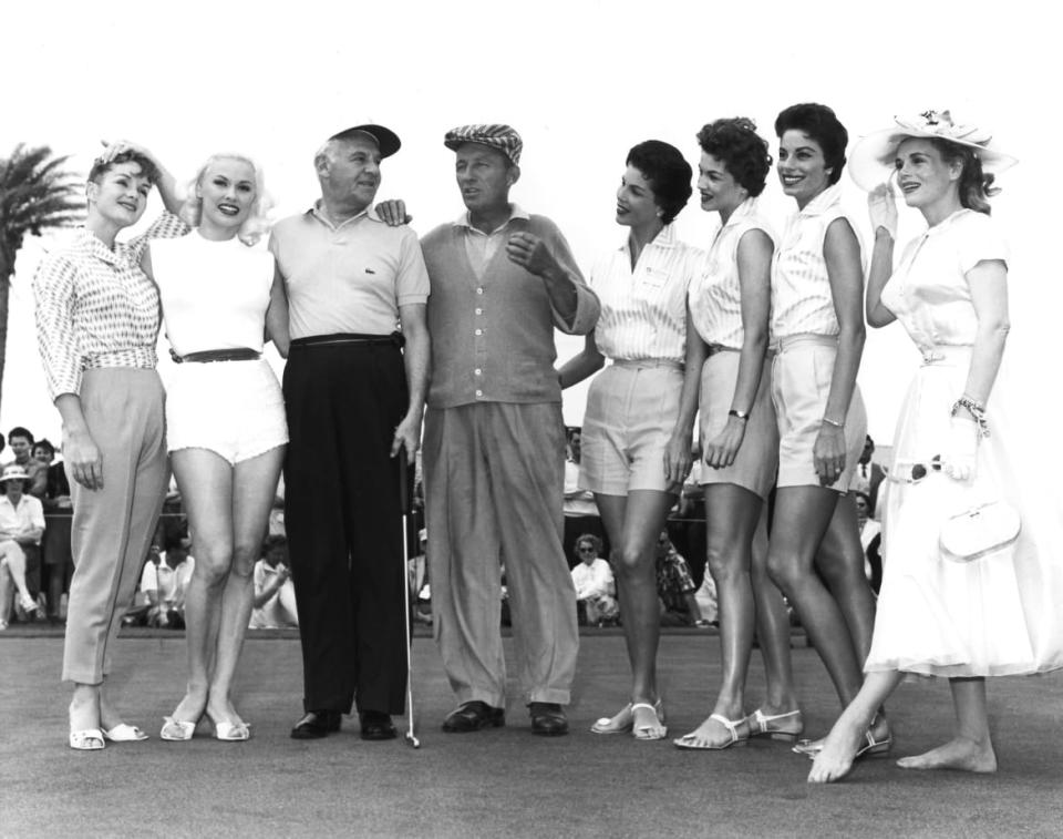 <div class="inline-image__caption"><p>Walter Winchell with, from left to right, Debbie Reynolds; Mamie Van Doren; Bing Crosby; Christine McGuire, Phyllis McGuire and Dorothy McGuire of The McGuire Sisters; and Marie Wilson in 1957.</p></div> <div class="inline-image__credit">Handout/Getty</div>