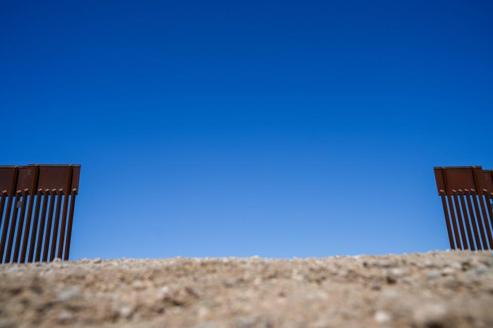 A gap in the border wall at the Morelos Dam on Aug. 10, 2022, in Yuma.