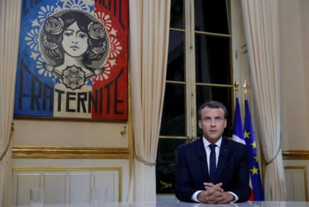 French President Emmanuel Macron is seen before his first long live television interview on prime time at the Elysee Palace in Paris, France, October 15, 2017. REUTERS/Philippe Wojazer