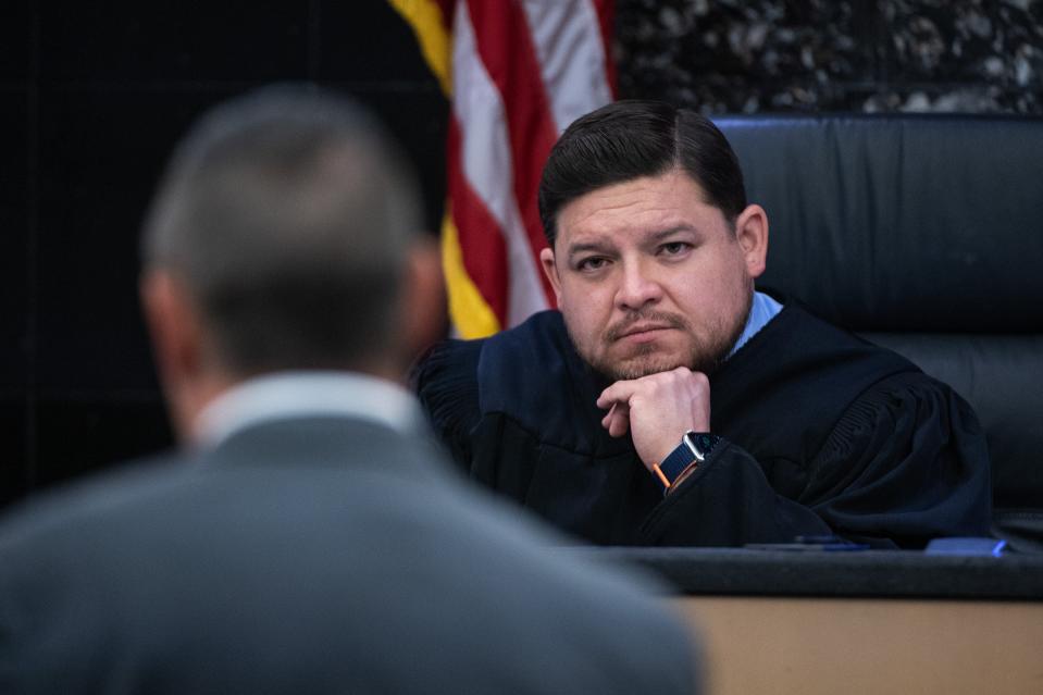 Circuit Judge Luis Delgado listens to attorney Doug Wyler, who represents Palm Beach County State Attorney Dave Aronberg, at the hearing over attorneys' fees Tuesday.