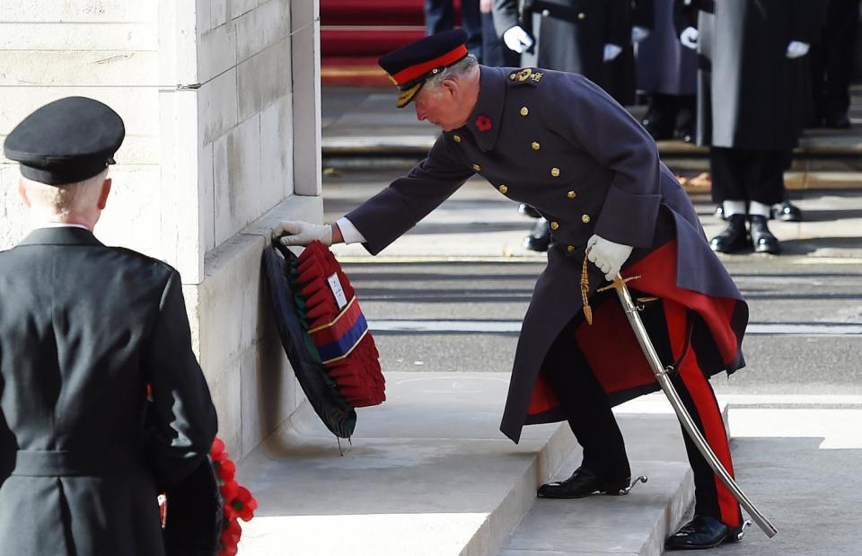 Prince Charles places the Queen's wreath at the Cenotaph at the National Service of Remebrance (EPA)