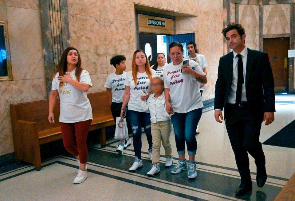 The family of Ariel Young leave the Jackson County Courthouse after Britt Reid was sentenced to three years in prison for driving while intoxicated and causing a 2021 crash that severely injured a 5-year-old Ariel.