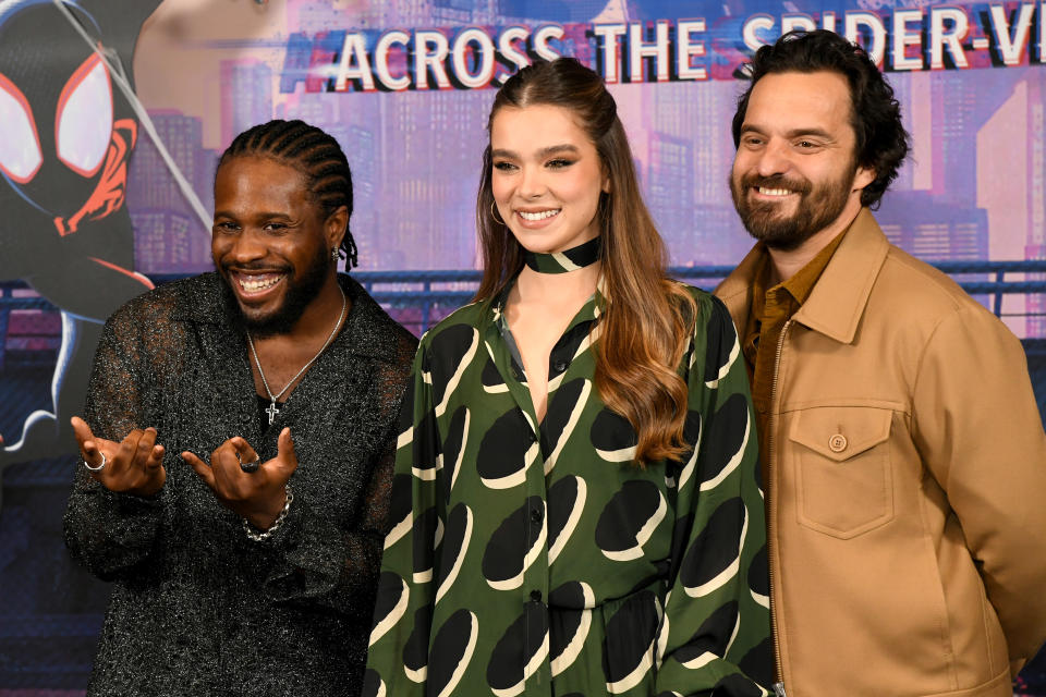 Shameik Moore posing with Hailee Steinfeld and Jake Johnson.