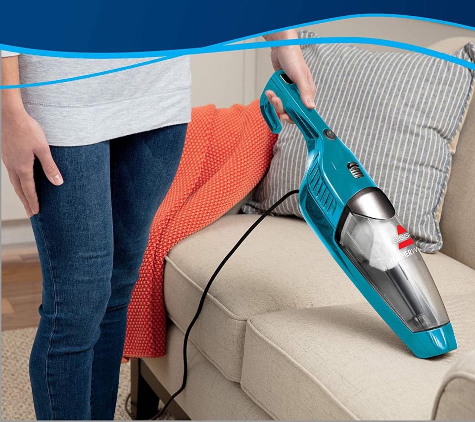 The Bissell Featherweight Turbo Lightweight Stick Vacuum converts into a handheld vacuum. Image via Amazon.