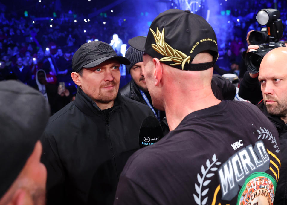 LONDON, ENGLAND - DECEMBER 03: Oleksandr Usyk (L) and Tyson Fury (R) face off after the wbc heavyweight championship bout at Tottenham Hotspur Stadium on December 03, 2022 in London, England.  (Photo by Mikey Williams/Top Rank Inc via Getty Images)