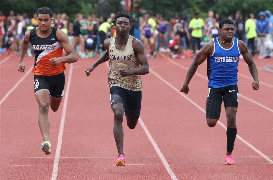 Marcus Nahim from Iona Prep competes in the boys 100 meter dash during the New York State Track and Field Championships at Middletown High School, June 9, 2023. He and teammate Justin Hargraves advanced to Saturday's next round of the 100.
(Credit: Mark Vergari/The Journal News)
