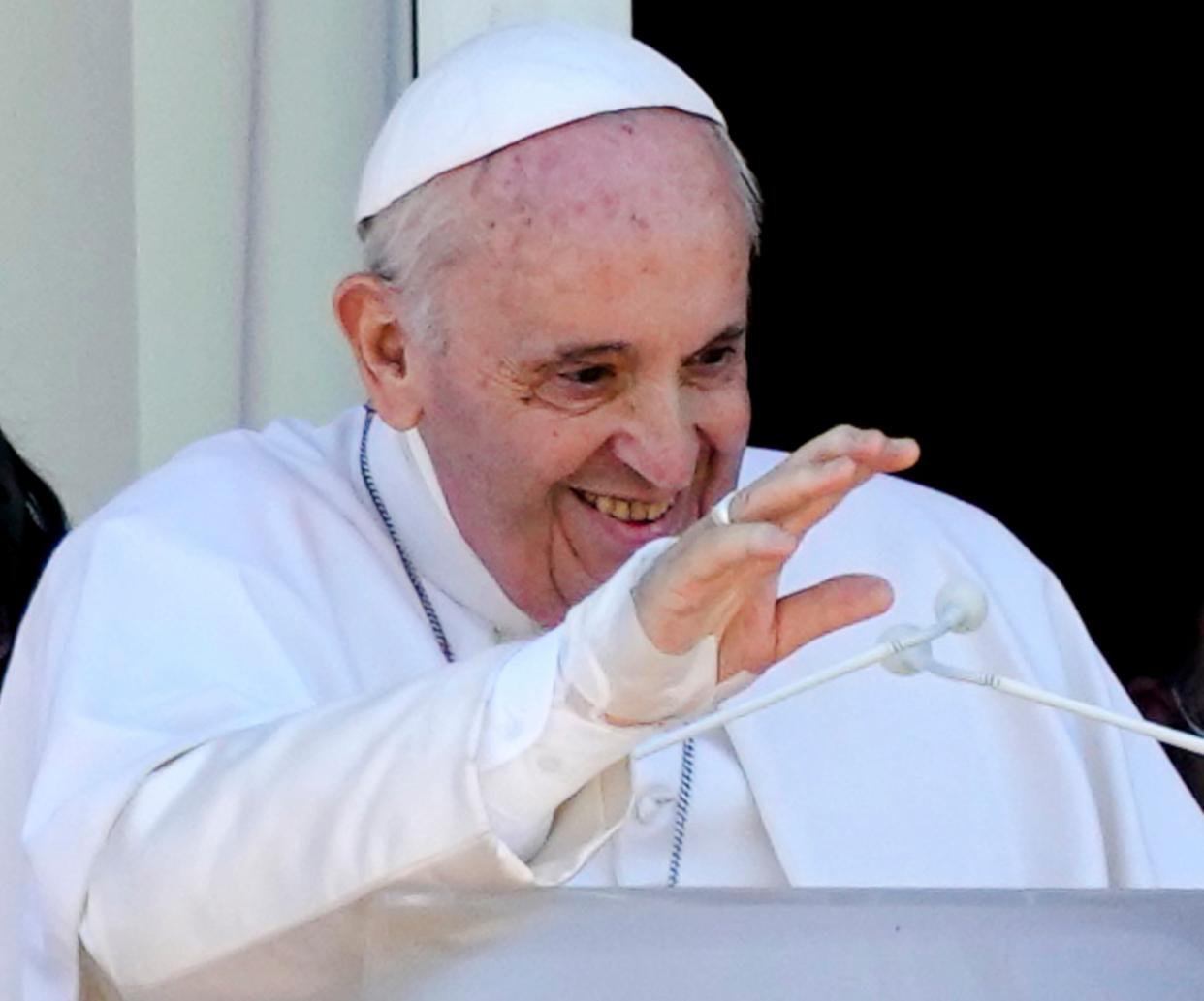 Pope Francis appears with young oncologic patients on a balcony of the Agostino Gemelli Polyclinic in Rome, July 11, 2021. 