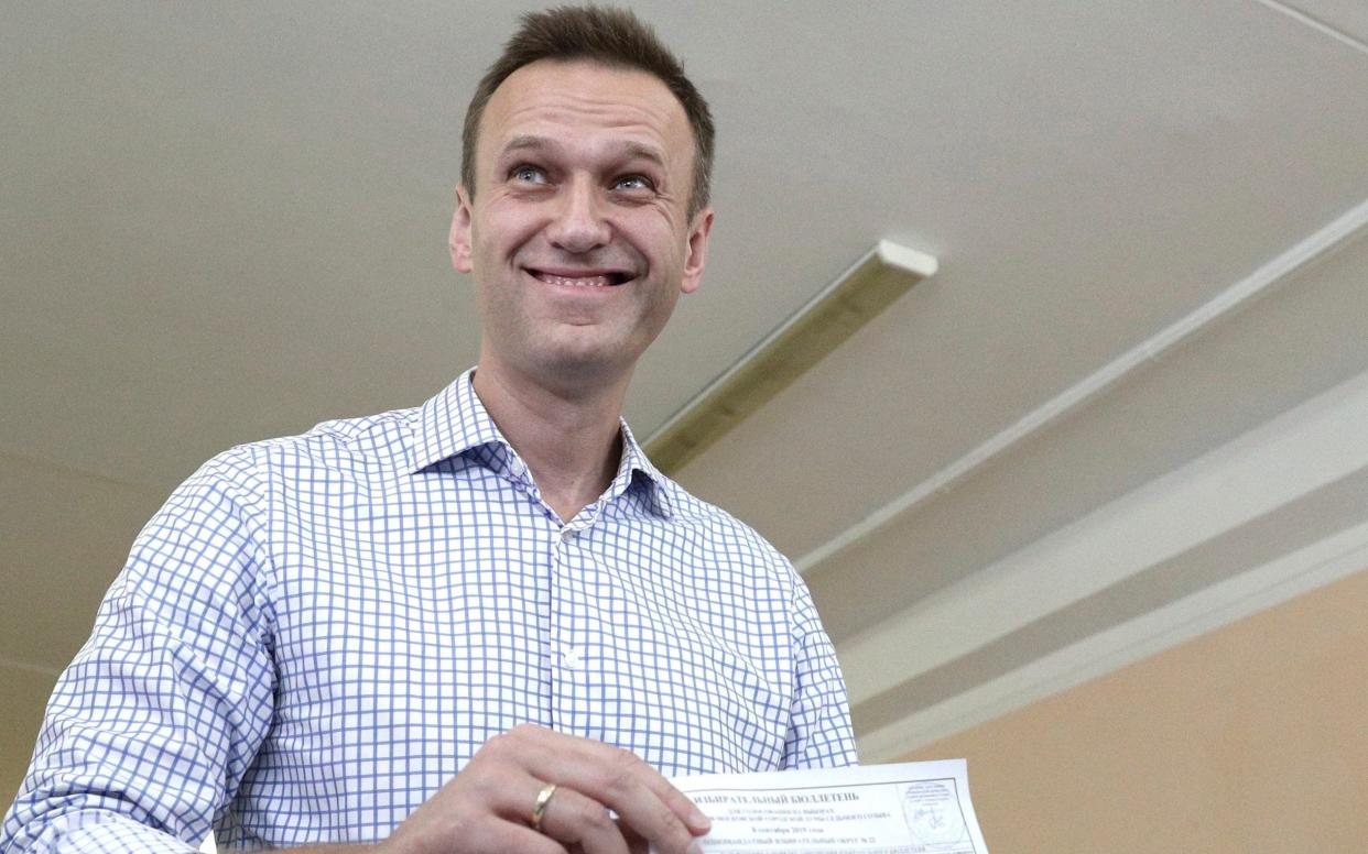 Alexei Navalny called on supporters to vote for a list of second-choice candidates after the liberal opposition was barred from the city council race - AP