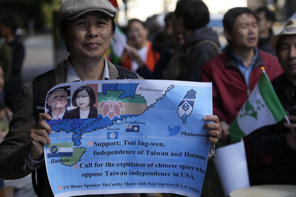 Supporters of Taiwan's President Tsai Ing-wen await her arrival outside The Westin Bonaventure Hotel in Los Angeles Tuesday, April 4, 2023. (AP Photo/Damian Dovarganes)