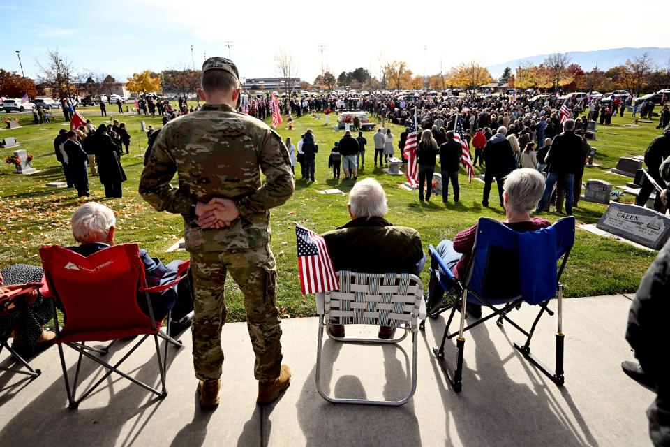 Family friends and community members attend a memorial service at American Fork city cemetery for U.S. Marine Corps Capt. Ralph Jim Chipman, who was lost during battle in Vietnam 50 years ago, on Saturday, Nov. 11, 2023. His remains were identified and returned to his family to be laid to rest. | Scott G Winterton, Deseret News