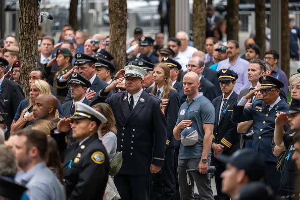 NEW YORK, NEW YORK - SEPTEMBER 11: Family, politicians, police, firefighters and others pay their respects as they visit the 9/11 Memorial and Museum at the Ground Zero site in lower Manhattan for commemoration ceremonies during the 22nd anniversary of the attacks on September 11, 2023 in New York City. Monday marks the 22nd anniversary of the September 11 terrorist attacks on the World Trade Center and the Pentagon, as well as the crash of United Airlines Flight 93. In total, the attacks killed nearly 3,000 people and commenced a global war on terror which included American led conflicts in both Iraq and Afghanistan.   (Photo by Spencer Platt/Getty Images)