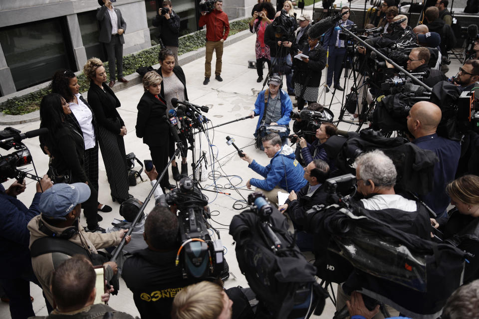FILE-In this Monday, Sept. 24, 2018 file photo, Attorney Gloria Allred, at podium, speaks with members of the media during a recess in Bill Cosby's sentencing hearing at the Montgomery County Courthouse, in Norristown Pa. A Pennsylvania appeals court will hear arguments, Monday, Aug. 12, 2019, as Cosby appeals his sexual assault conviction. The 82-year-old Cosby is serving a three- to 10-year prison term. (AP Photo/Matt Rourke, FILE)