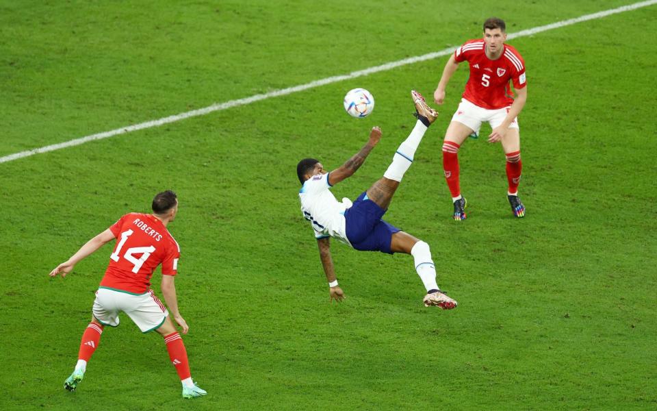 Marcus Rashford hooks his overhead over the bar - REUTERS/Marko Djurica