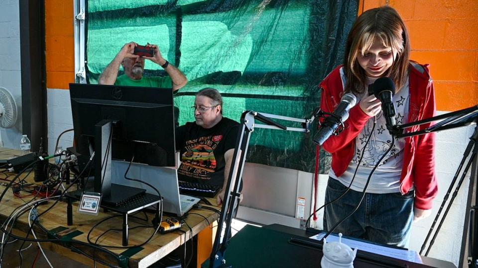 Kennedy, a member of Sacramento Girl Scouts Troop 1089, uses microphones Saturday to ask a question she will ask an astronaut on the International Space Station next week. The scouts were testing out the ham radio they built with the River City Amateur Radio Communications Society after being selected for the STEM program by The National Aeronautics and Space Administration.